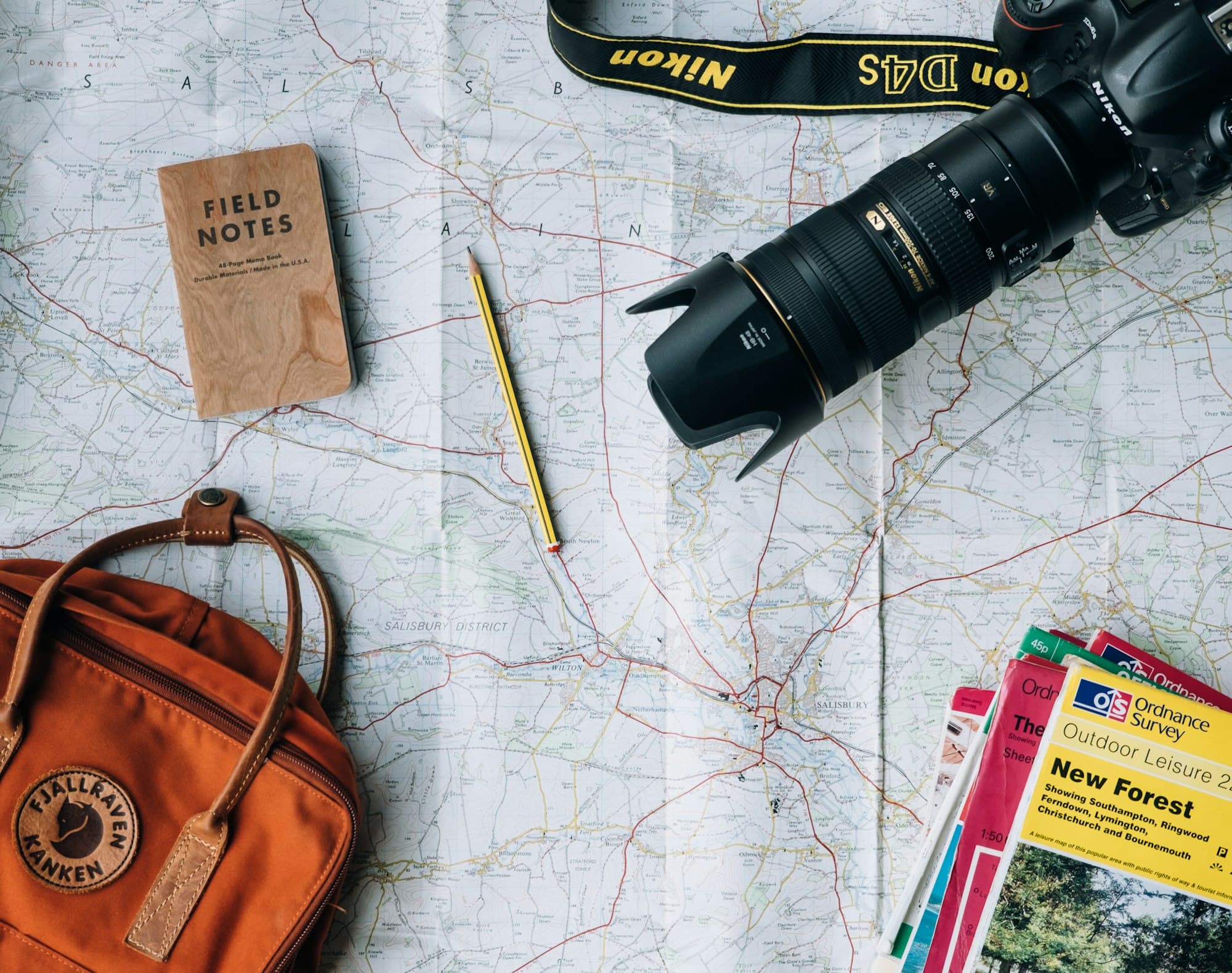 Notebook in warm light — evergreen travel insurance notes.